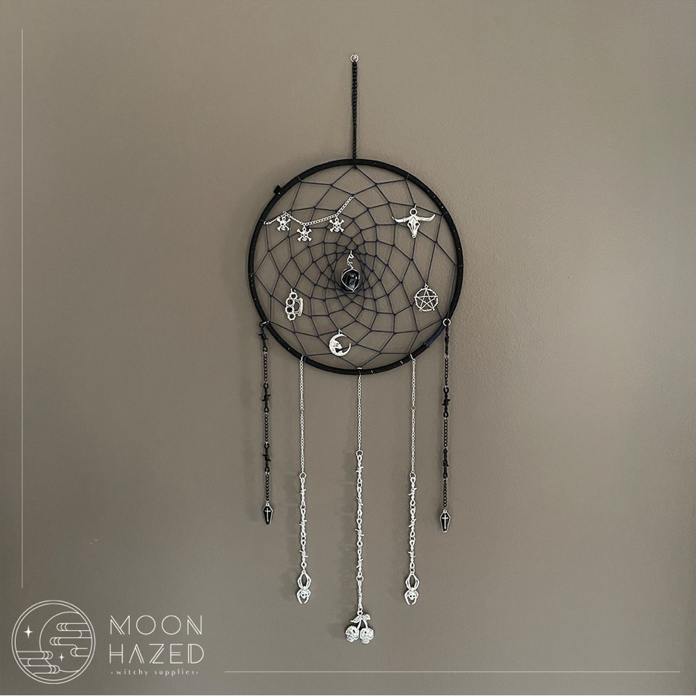 Punk Dreamcatcher with black obsidian hanging in the middle.